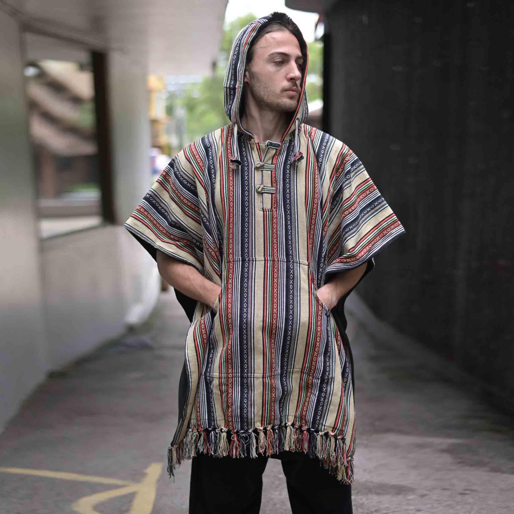 Poncho wolf en haan in groot unisex model Poncho wolf en haan in groot unisex model